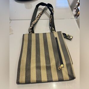 Elegant Black and Gold Striped Crossbody Bag